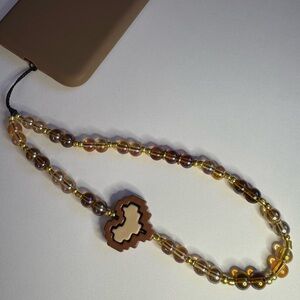 Cell phone wristlet from The Charm Hut works on any phone case